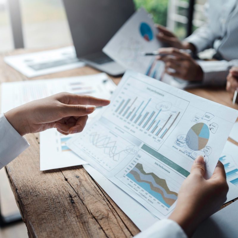 Business team meeting and presenting business results discussion and analysis data chart and graph, finance and accounting. Business performance concept.